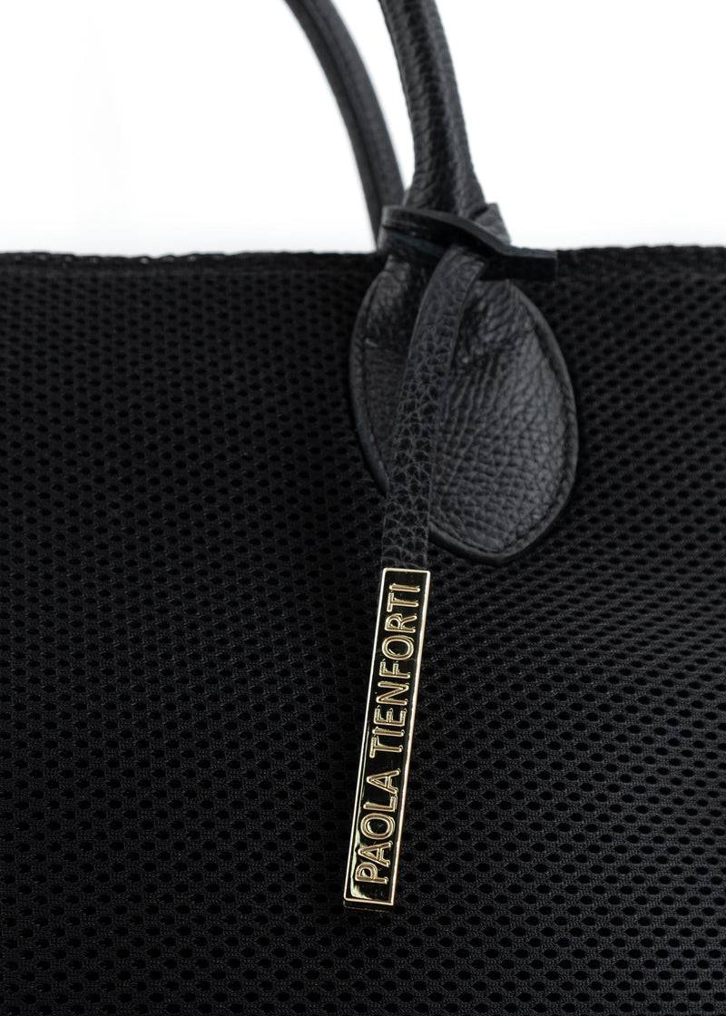 Paola T. Shopper in traforato con pendente argento Vendita