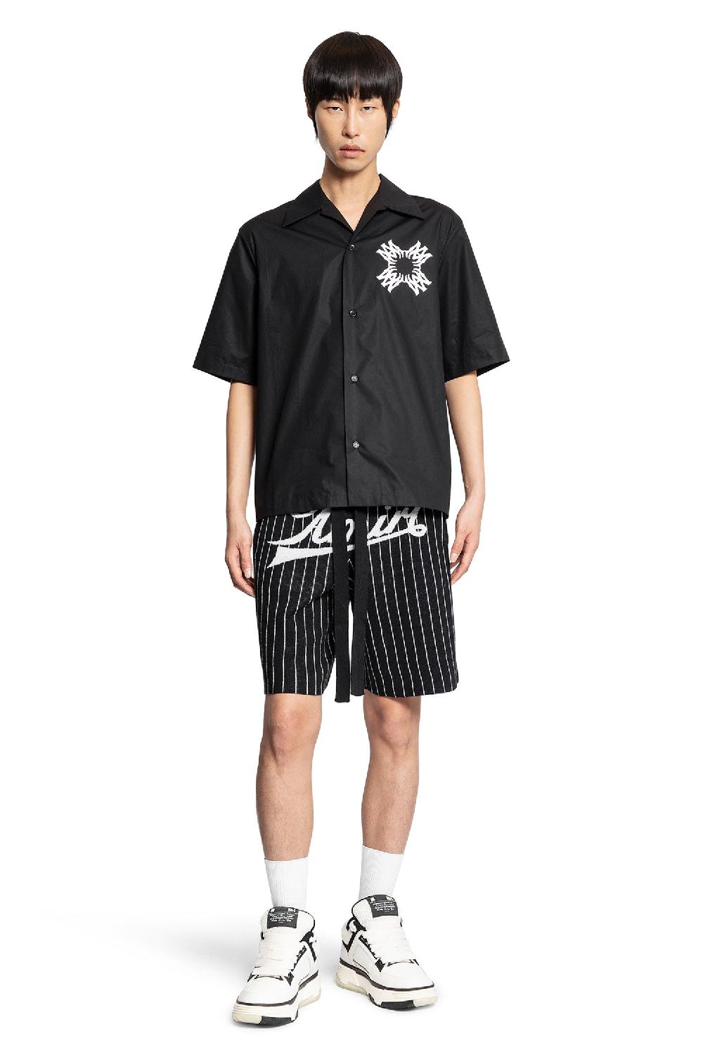Antonioli AMIRI MAN BLACK&WHITE SHORTS & SKIRTS Prezzo basso