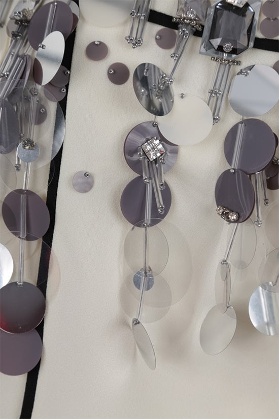 PRADA miniabito in sablé con decorazione gioiello Moda