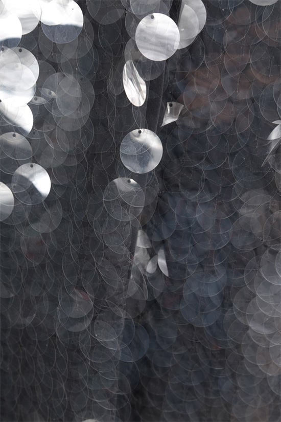 PRADA cappotto in tessuto tecnico decorato con paillettes 2025