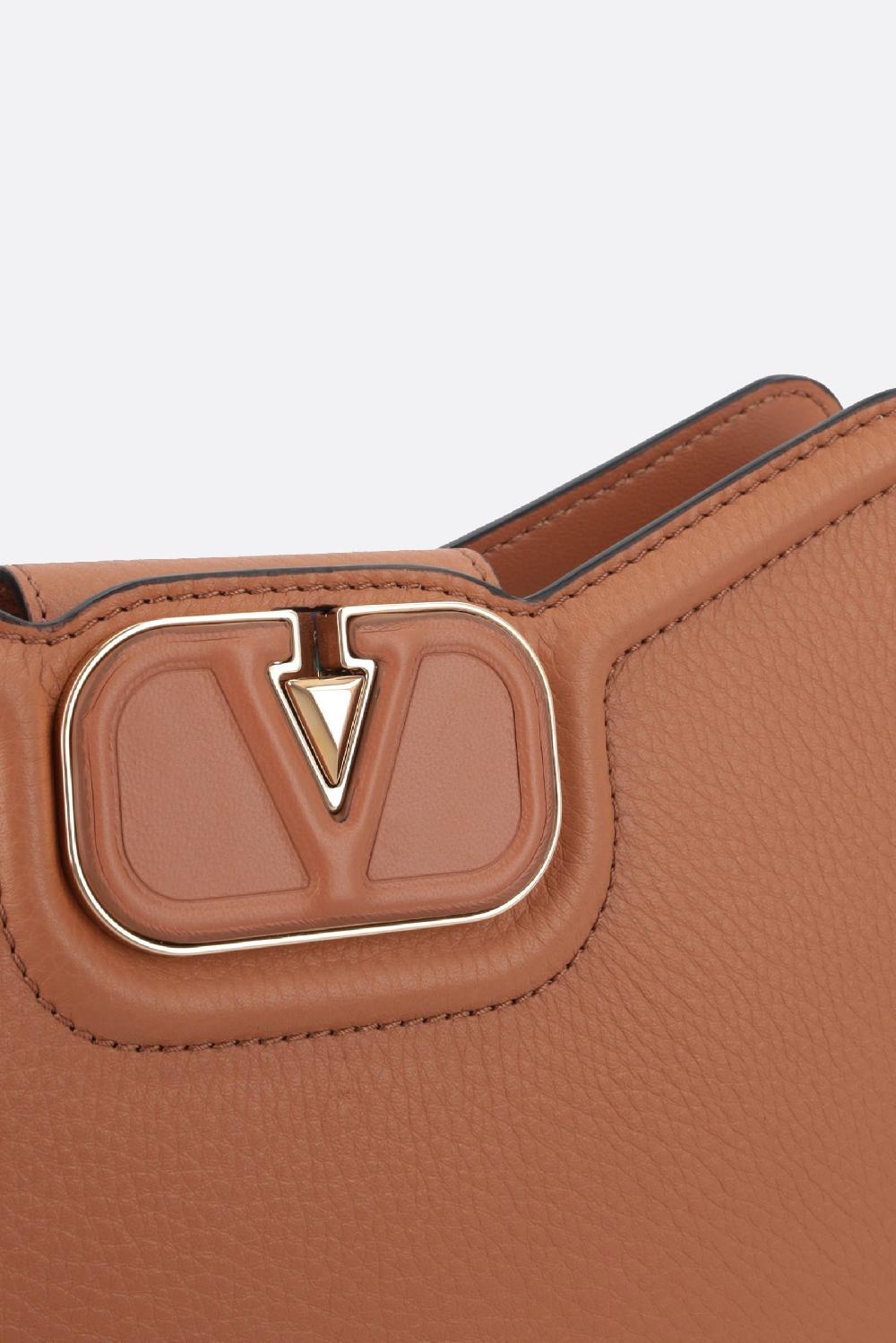 VALENTINO GARAVANI borsa a tracolla Vlogo Leather in pelle martellata In Vendita