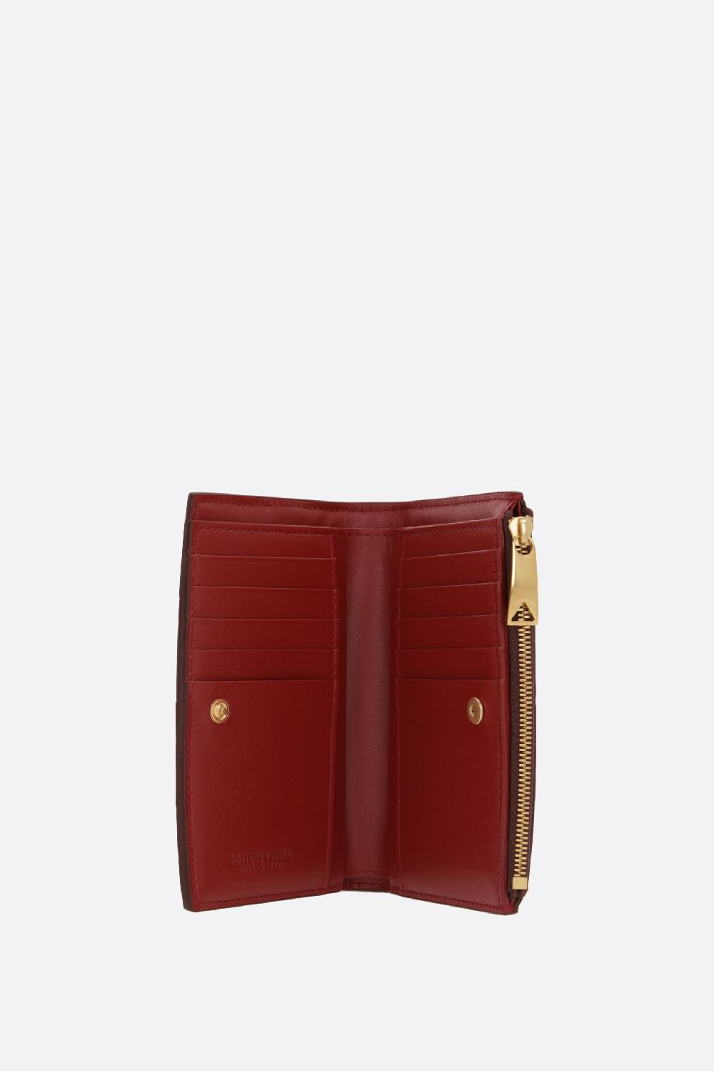 BOTTEGA VENETA portafoglio bi-fold medio Cassette in Maxi Intrecciato nappa Italia
