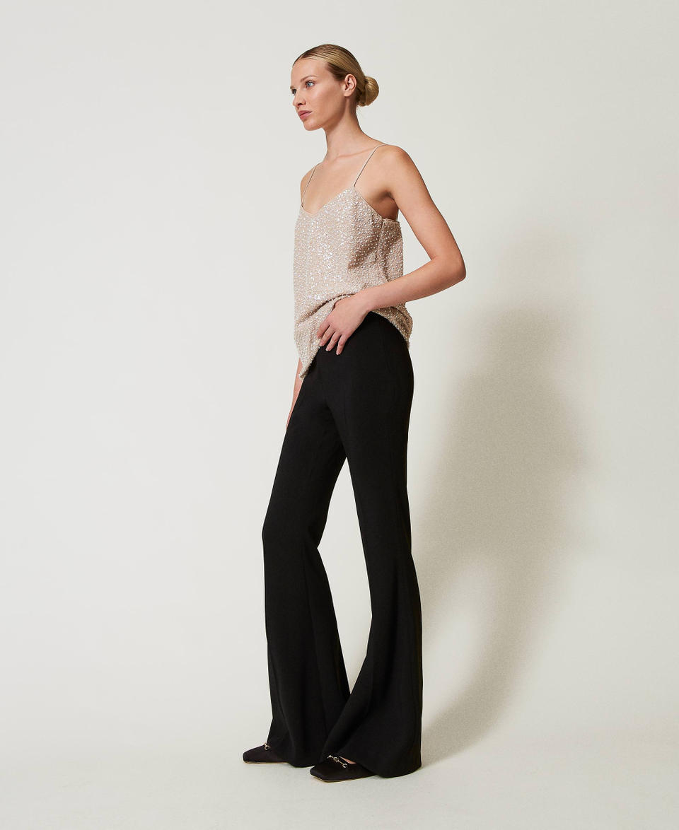 Twin Set Pantaloni flare in crêpe fluido Acquista Ora