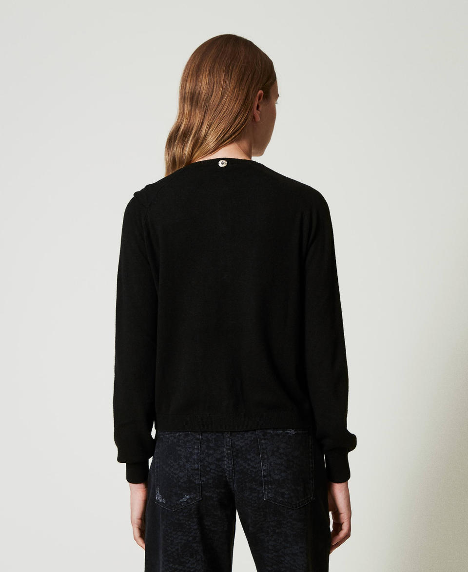 Twin Set Cardigan in misto lana con maxi fiocco Vendite Flash